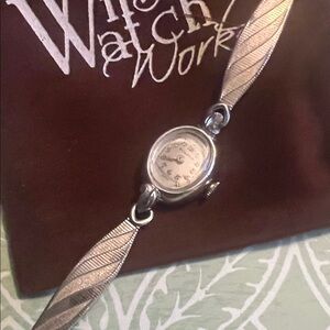 Bulova Silver Women's Mechanical Watch with Leaf Design